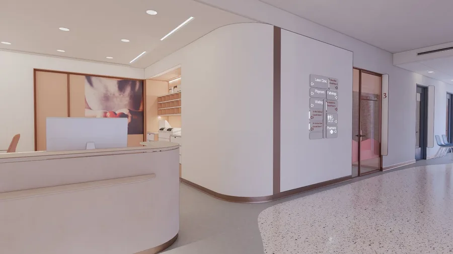 Curved medical clinic reception desk with a wall-mounted wayfinding sign listing Laser Clinic, Playroom, Pathology and Waiting