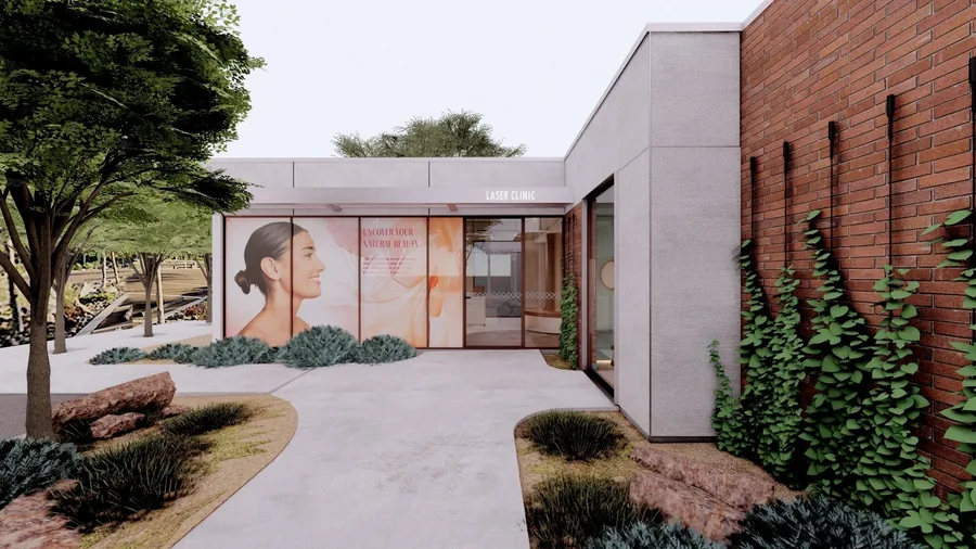 Modern laser clinic shopfront exterior with a large window decal and landscaped garden entrance